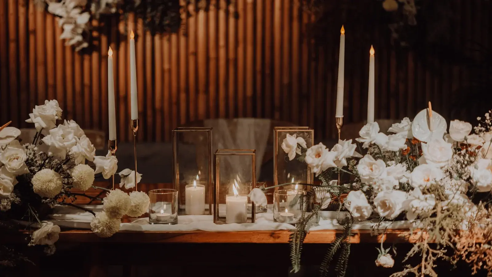 The Orangery at dusk, lit with candlelight