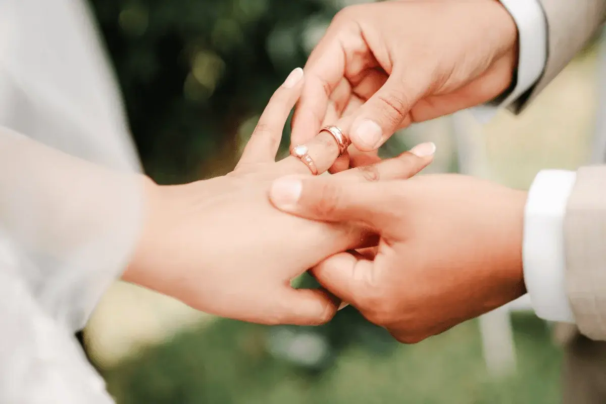 Ring exchange moment captured in warm afternoon light