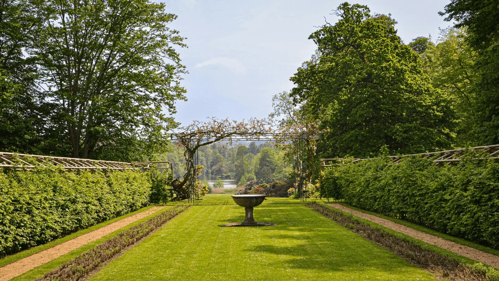 The formal gardens at Willowmere House in full summer bloom